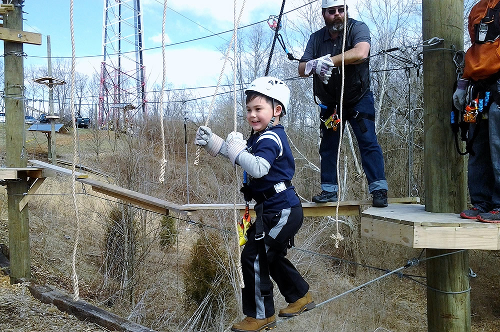 Family on Aerial Challenge Course