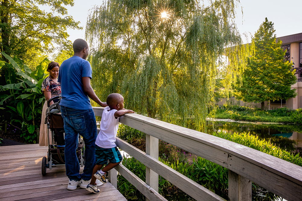 Family Walking in Creation Museum Botanical Gardens