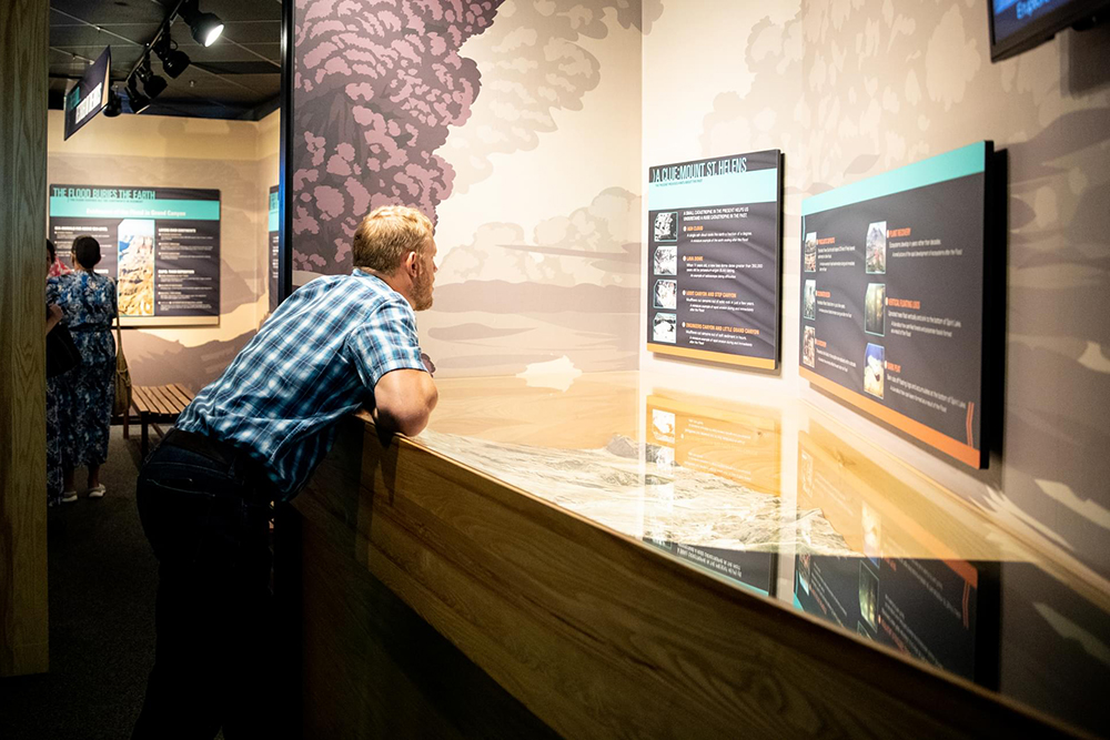 Guest Looking at Mt. St. Helens Signage